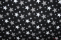 Mobile Preview: Jersey Sterne schwarz (10 cm)